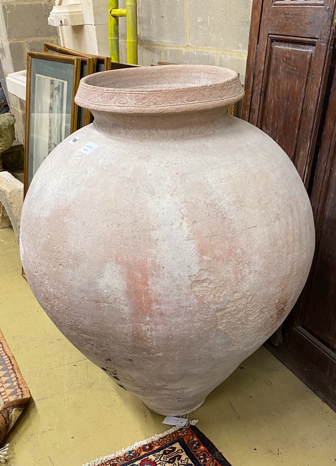 A large circular earthenware garden urn, height 94cm